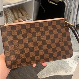 Brown Louis Vuitton wristlet
